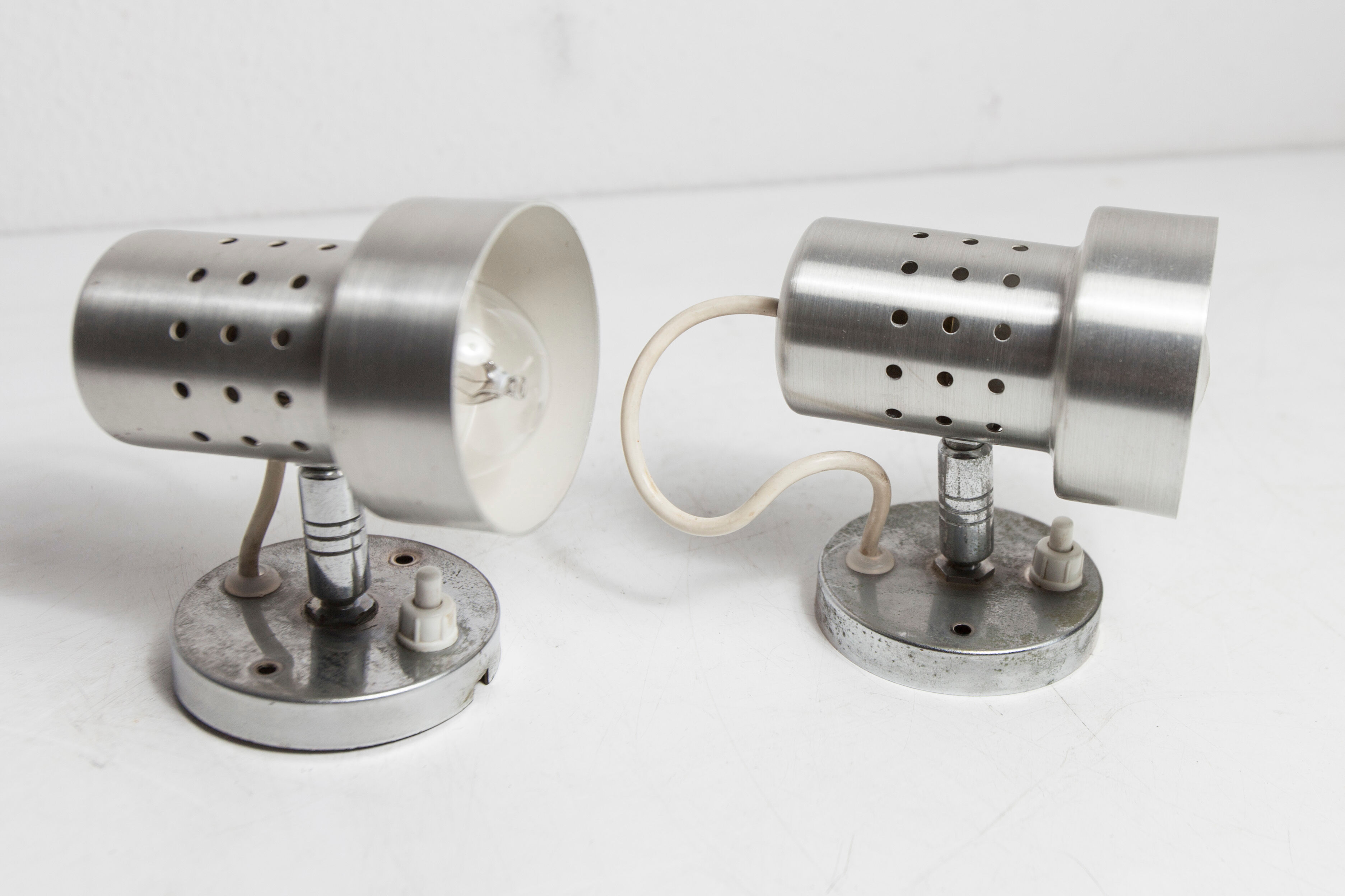 Pair of modernist wall lights in aluminum 1970