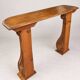 Old console in carved wood with scrolls