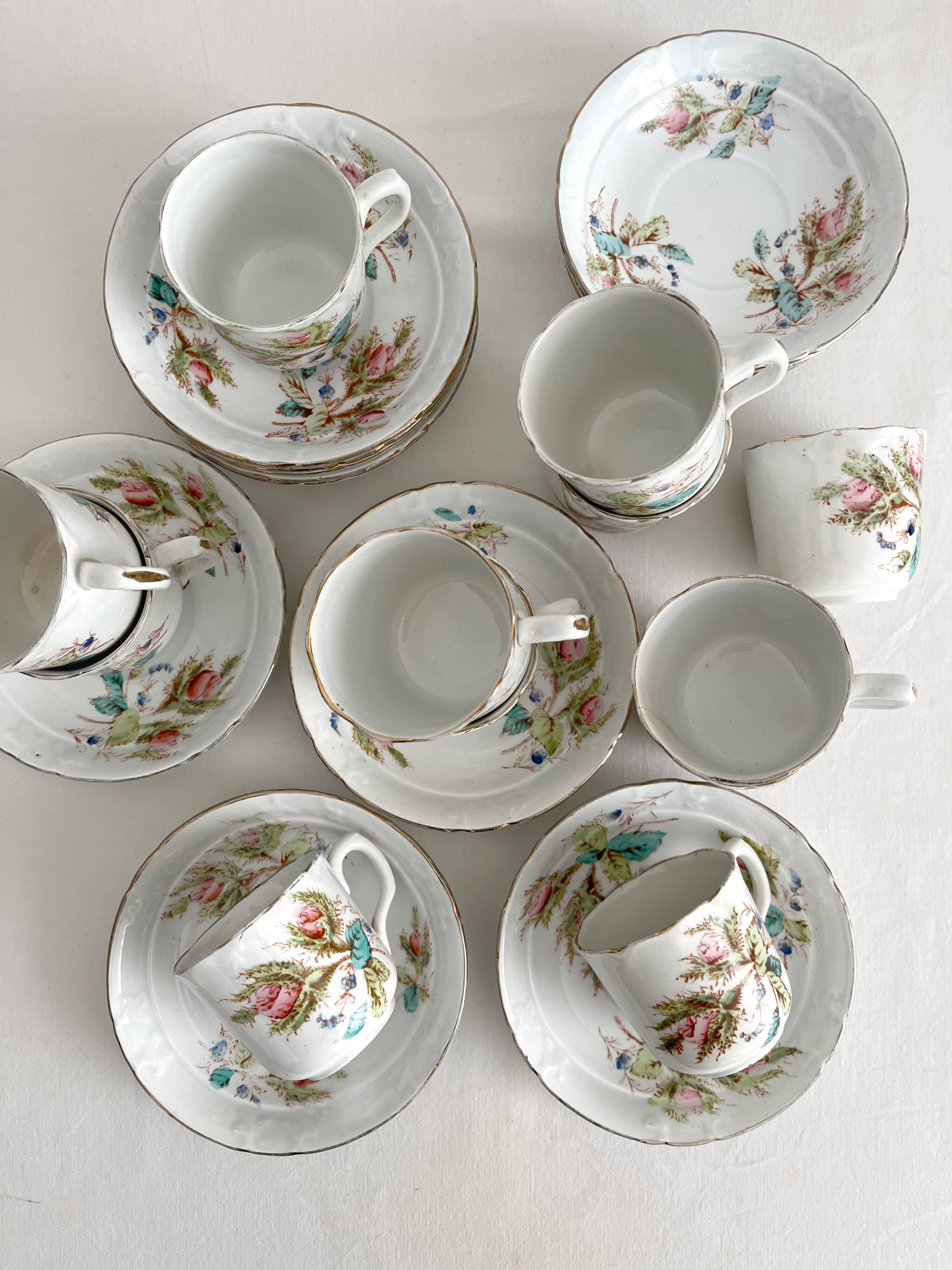 12 ironstone coffee cups with polychrome floral decoration, KG Lunéville