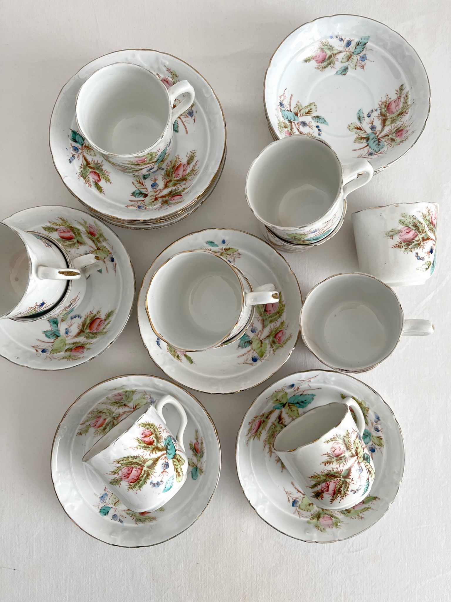 12 ironstone coffee cups with polychrome floral decoration, KG Lunéville