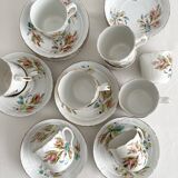 12 ironstone coffee cups with polychrome floral decoration, KG Lunéville