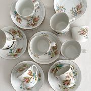 12 ironstone coffee cups with polychrome floral decoration, KG Lunéville