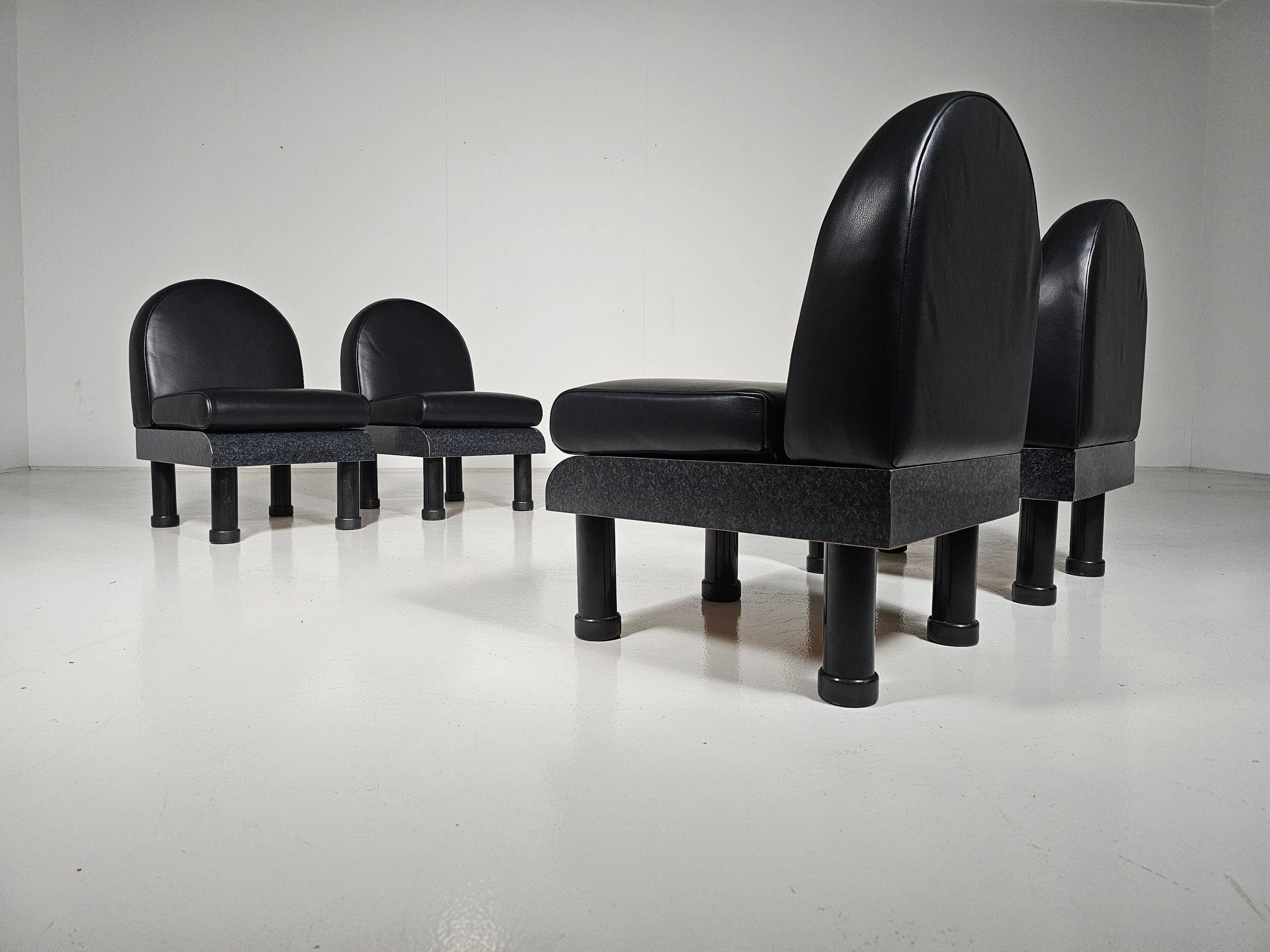 Black leather loungers , 1980.