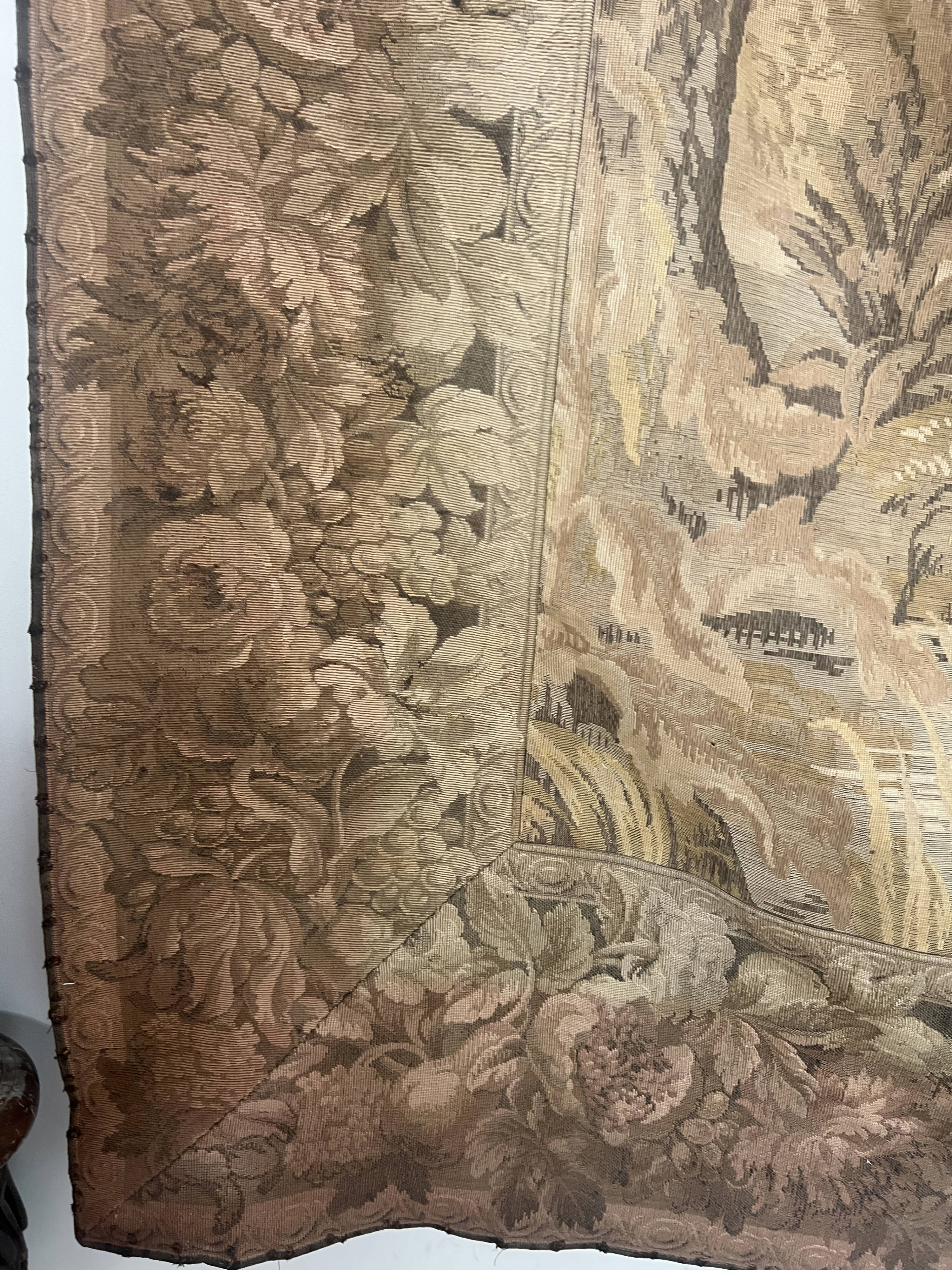Renaissance-style tapestry with animal motifs, 20th century.