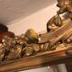 Large antique mirror with flagship shell in wood and gilded stucco