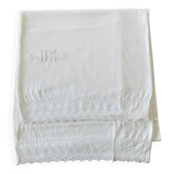 Old bolster case with lace edge and embroidered.