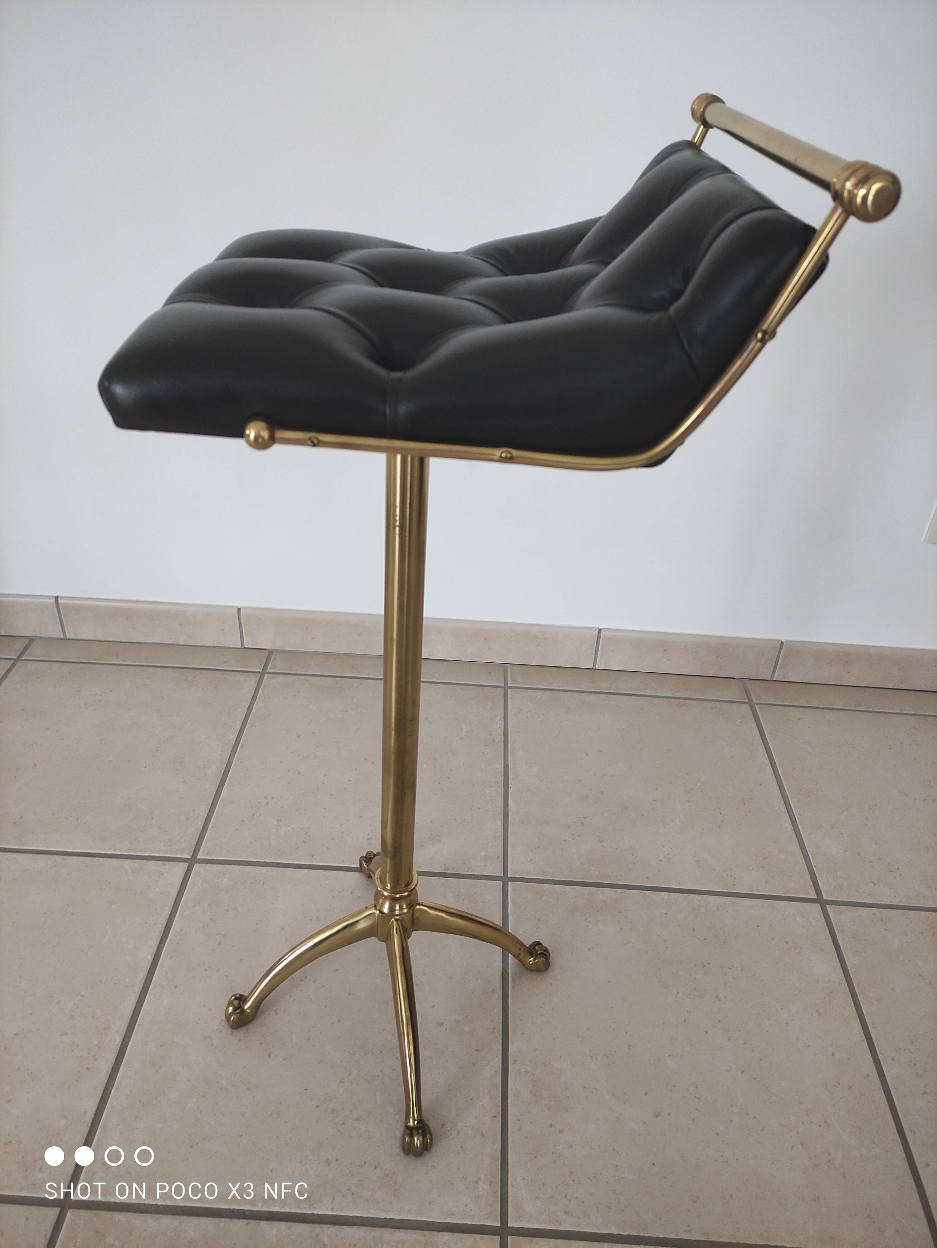 Brass padded leather stool