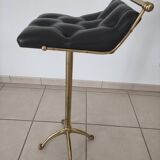Tabouret en cuir capitonné laiton