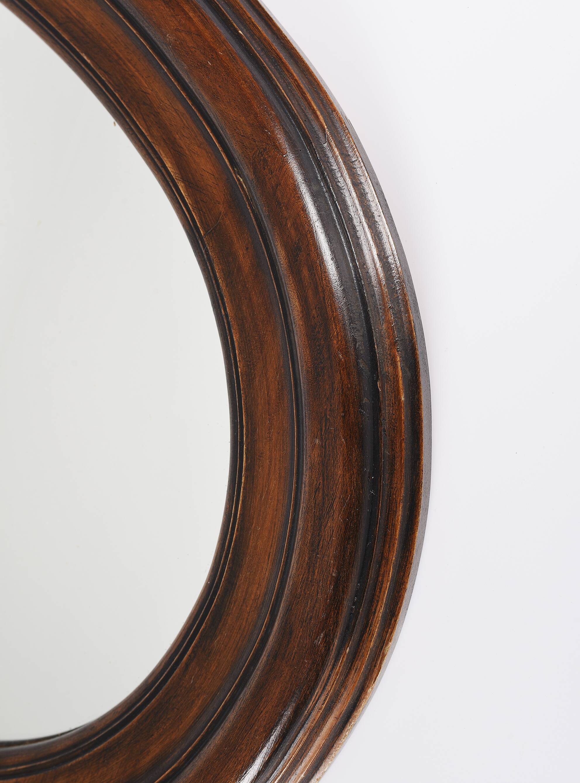 Large old oval wooden mirror