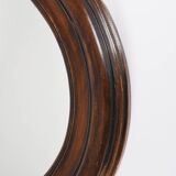 Large old oval wooden mirror