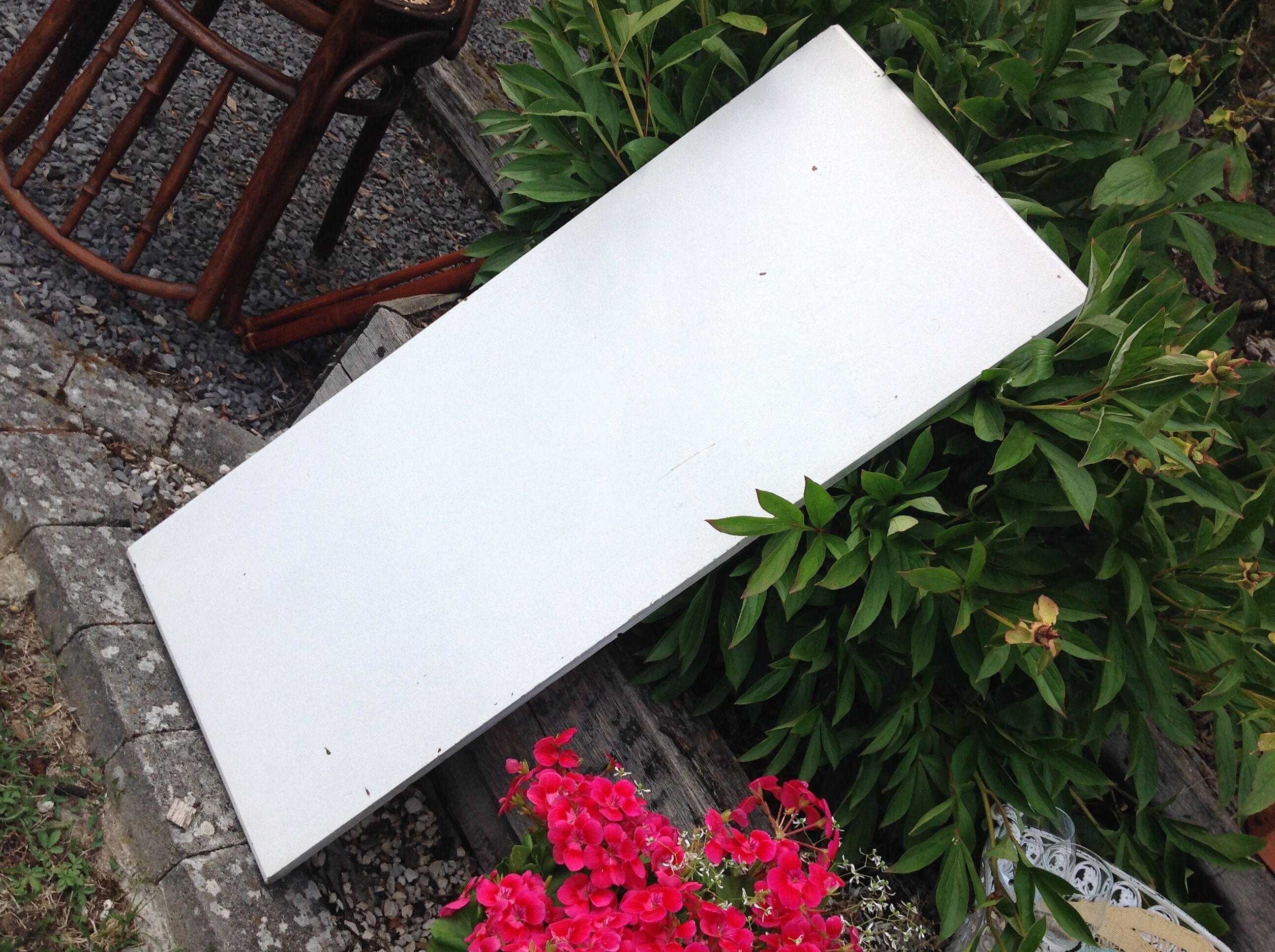 White farmhouse table set and four chairs