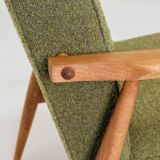 Vintage wild green bouclé armchair design by H.Lis