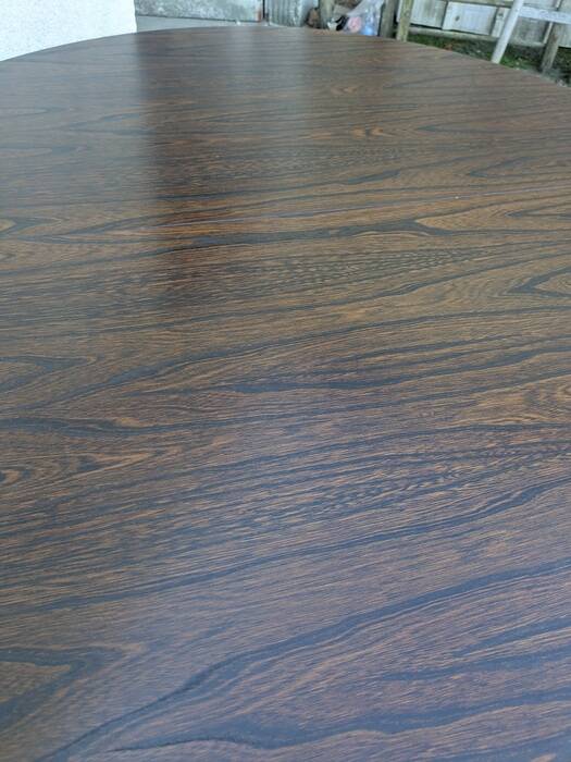 Round table with butterfly extensions