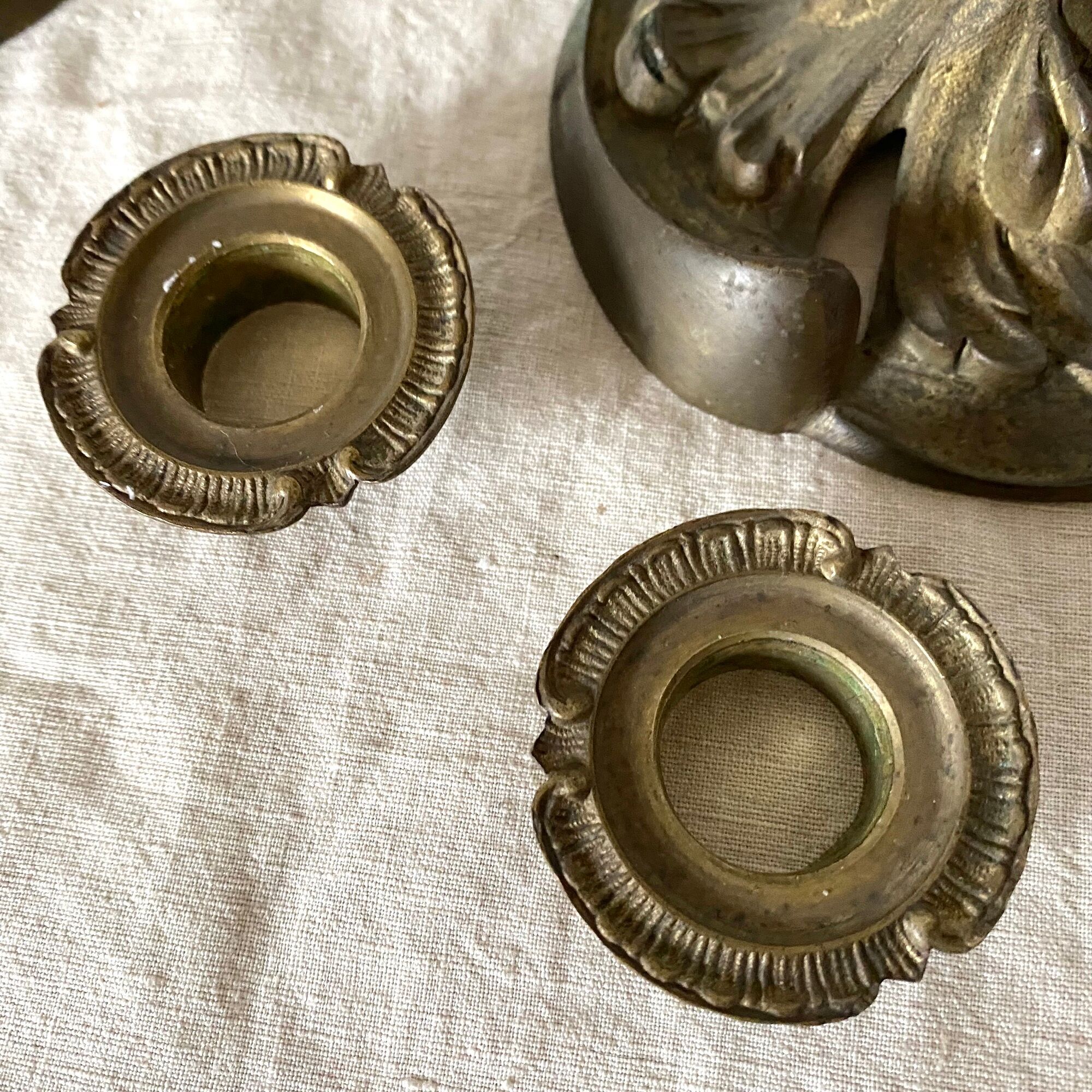 Pair of antique bronze candlesticks at the end of the table XIXth