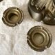 Pair of antique bronze candlesticks at the end of the table XIXth