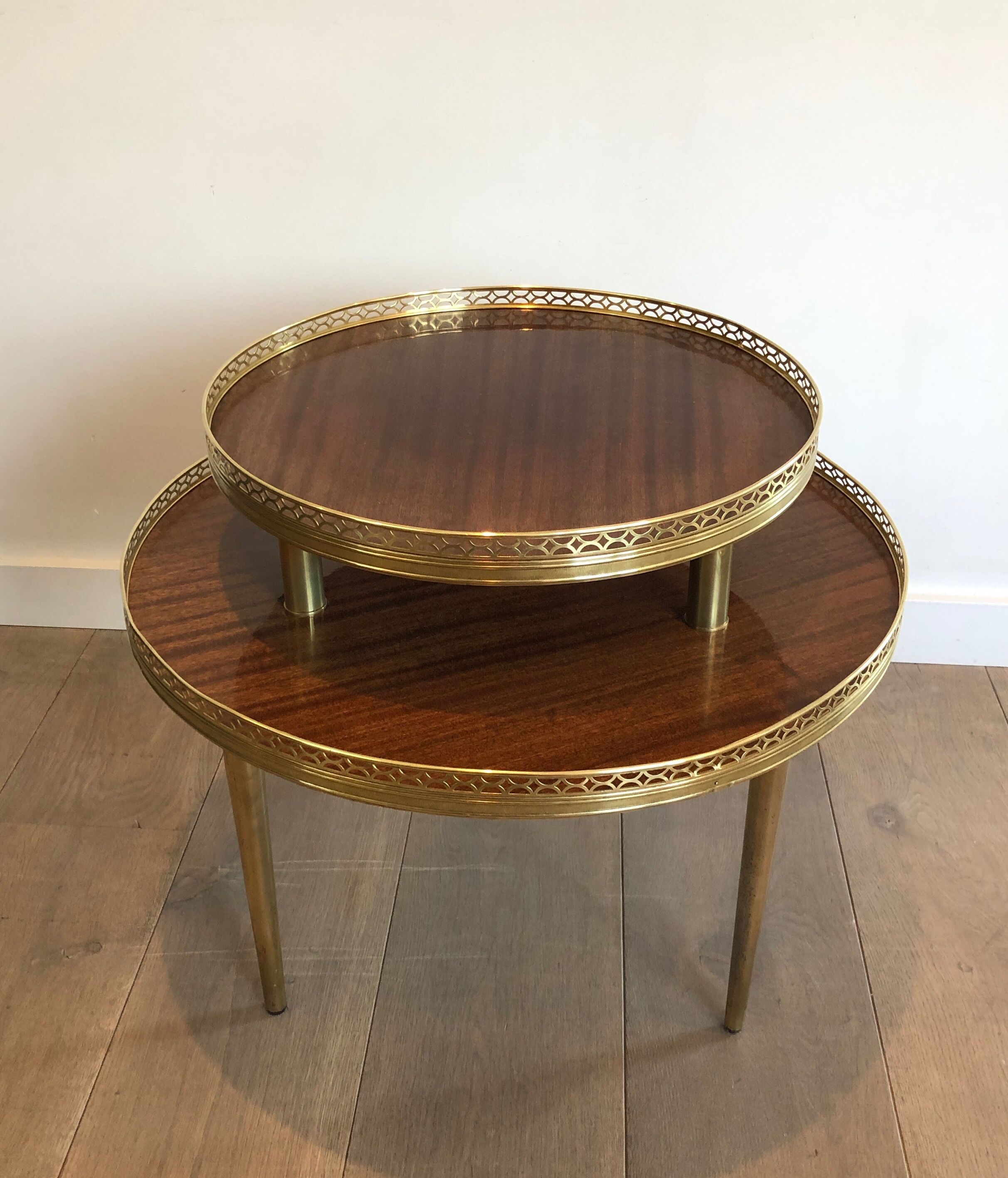 Neoclassical style tripod pedestal in mahogany, brass