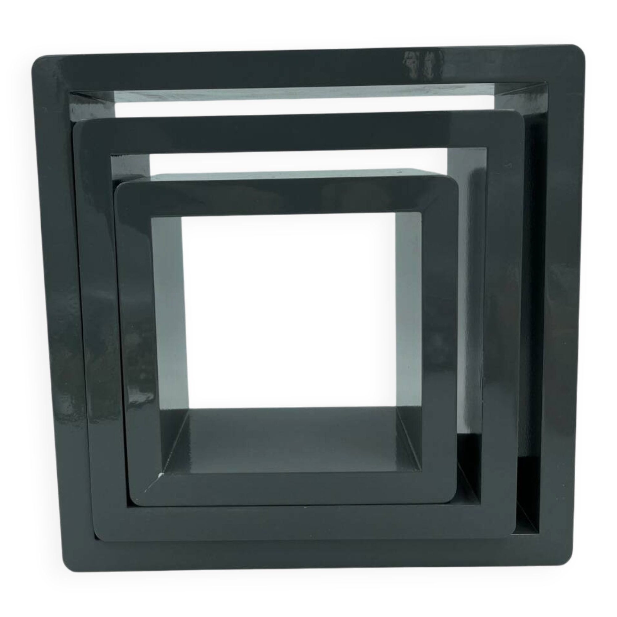 3 nesting shelves in grey lacquer.