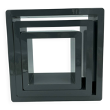 3 nesting shelves in grey lacquer.
