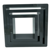 3 nesting shelves in grey lacquer.