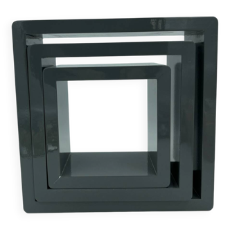 3 nesting shelves in grey lacquer.
