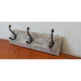 Wooden hanger in a rustic style.