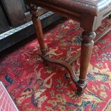 Wooden bench or piano bench with tanned seat