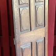 France old 18th century walnut closet door. Composed of 8 finely carved panels.