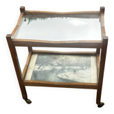 Desserte roulante ancienne en bois, miroir et décor sous verre – année