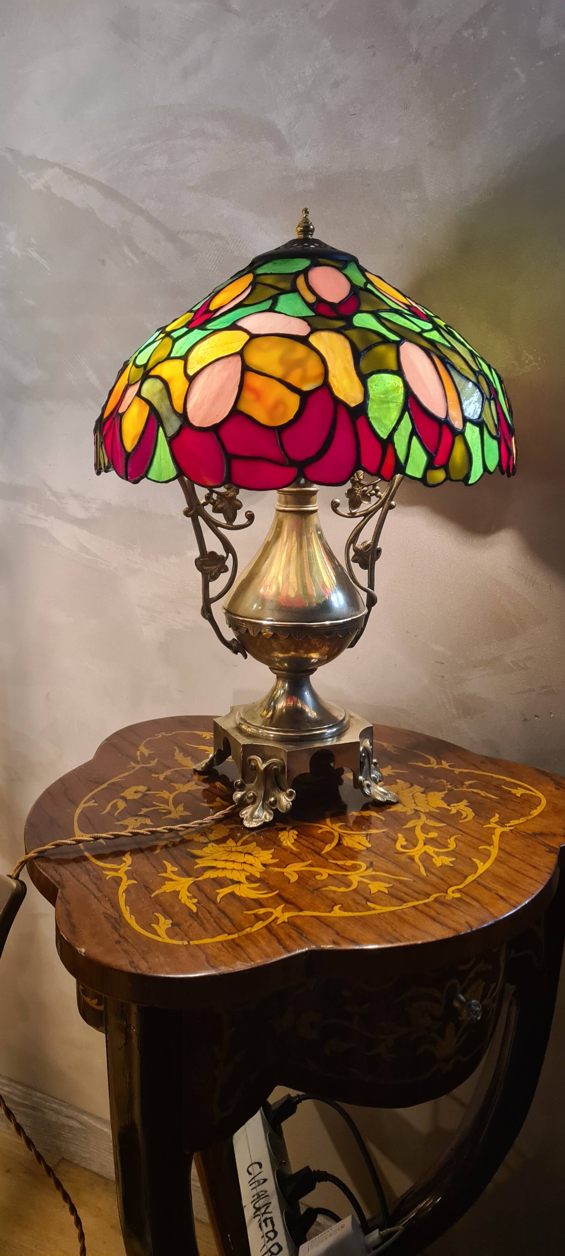 Antique bronze lamp and Tiffany-style stained glass shade. 46x32
