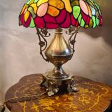 Antique bronze lamp and Tiffany-style stained glass shade. 46x32