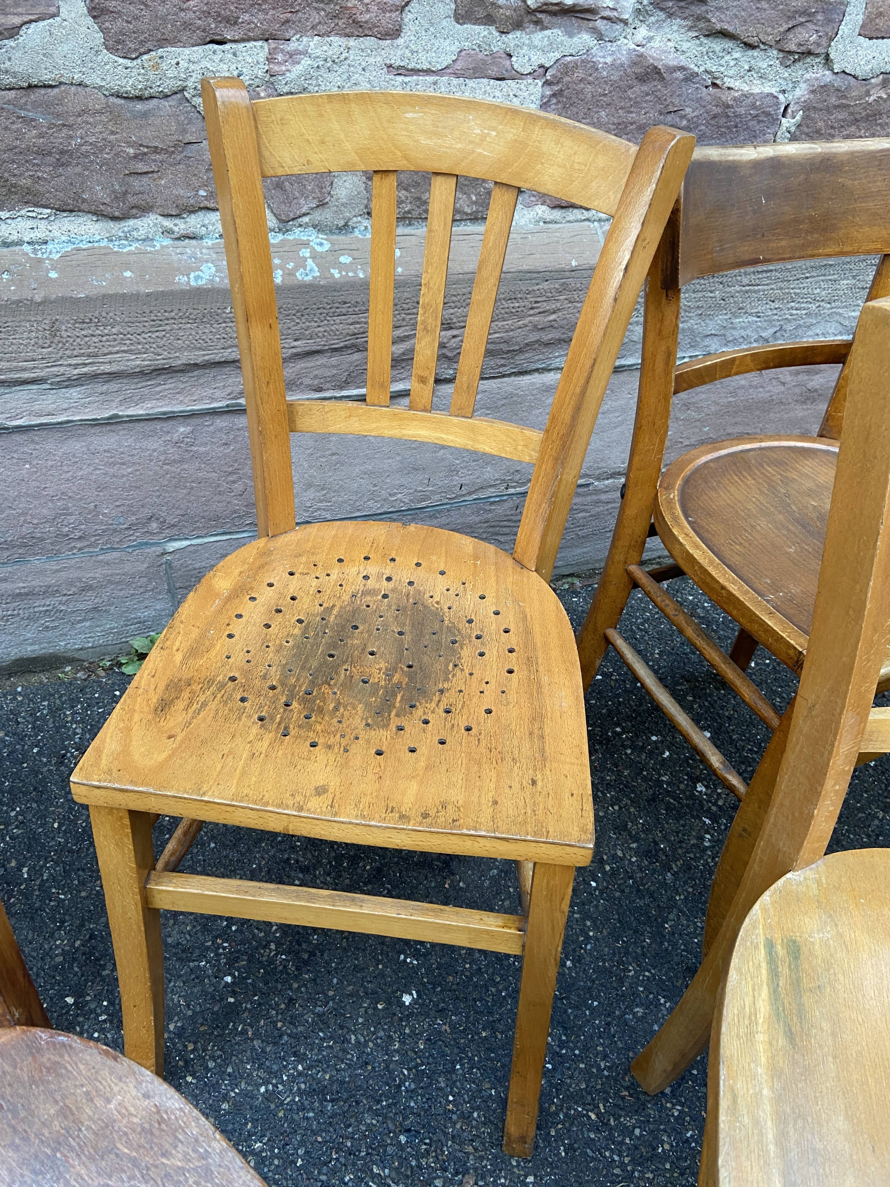 Set of vintage mismatched bistro chairs