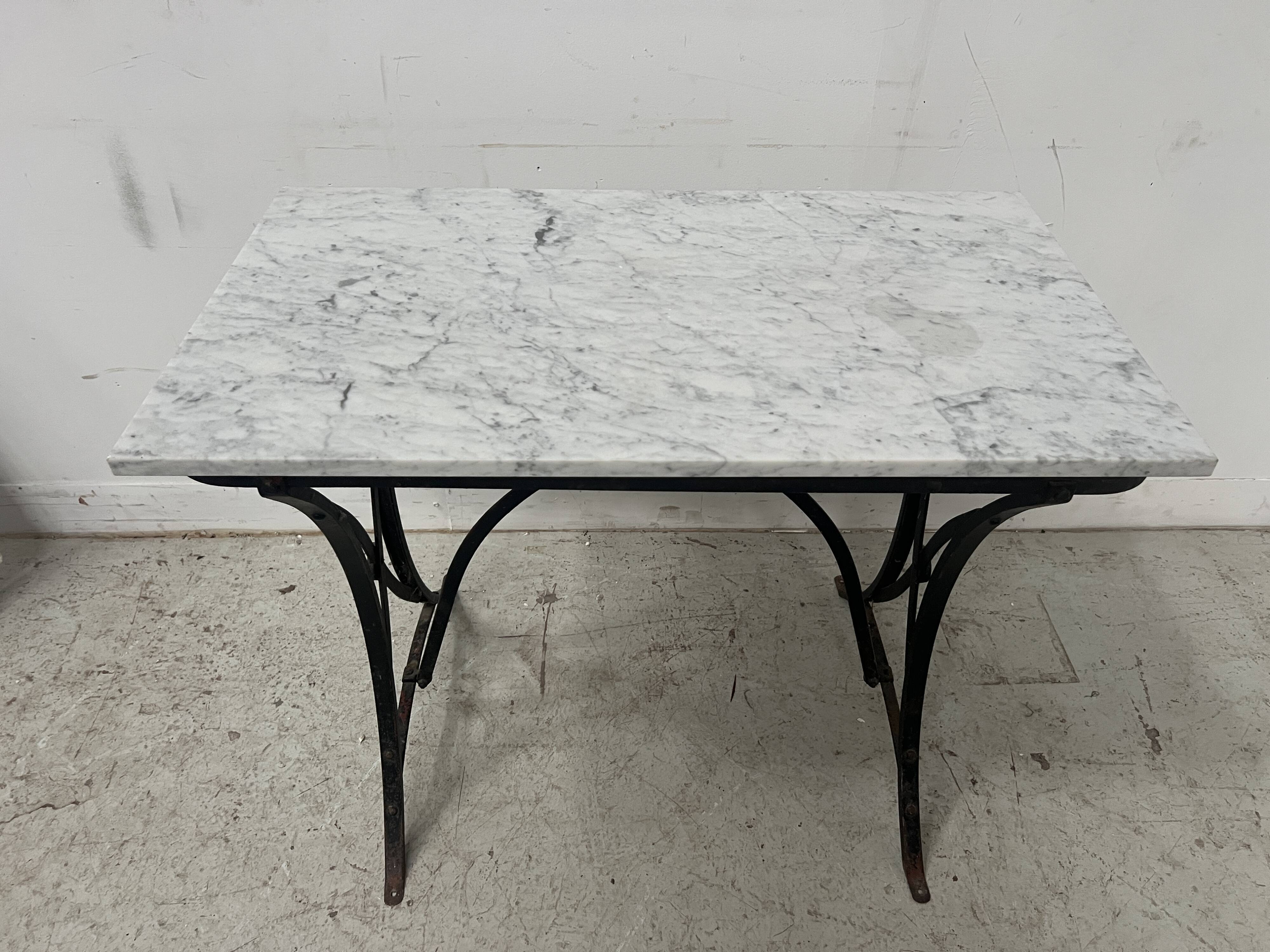 Garden table or veranda in cast iron from the 20th century.