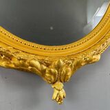 Miroir ovale doré style Louis XVI, XIXe siècle