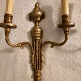 Pair of Louis XVI style neoclassical wall sconces in gilt bronze
