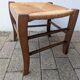 Antique solid wood stool with traditional rush seating – Late 19th century