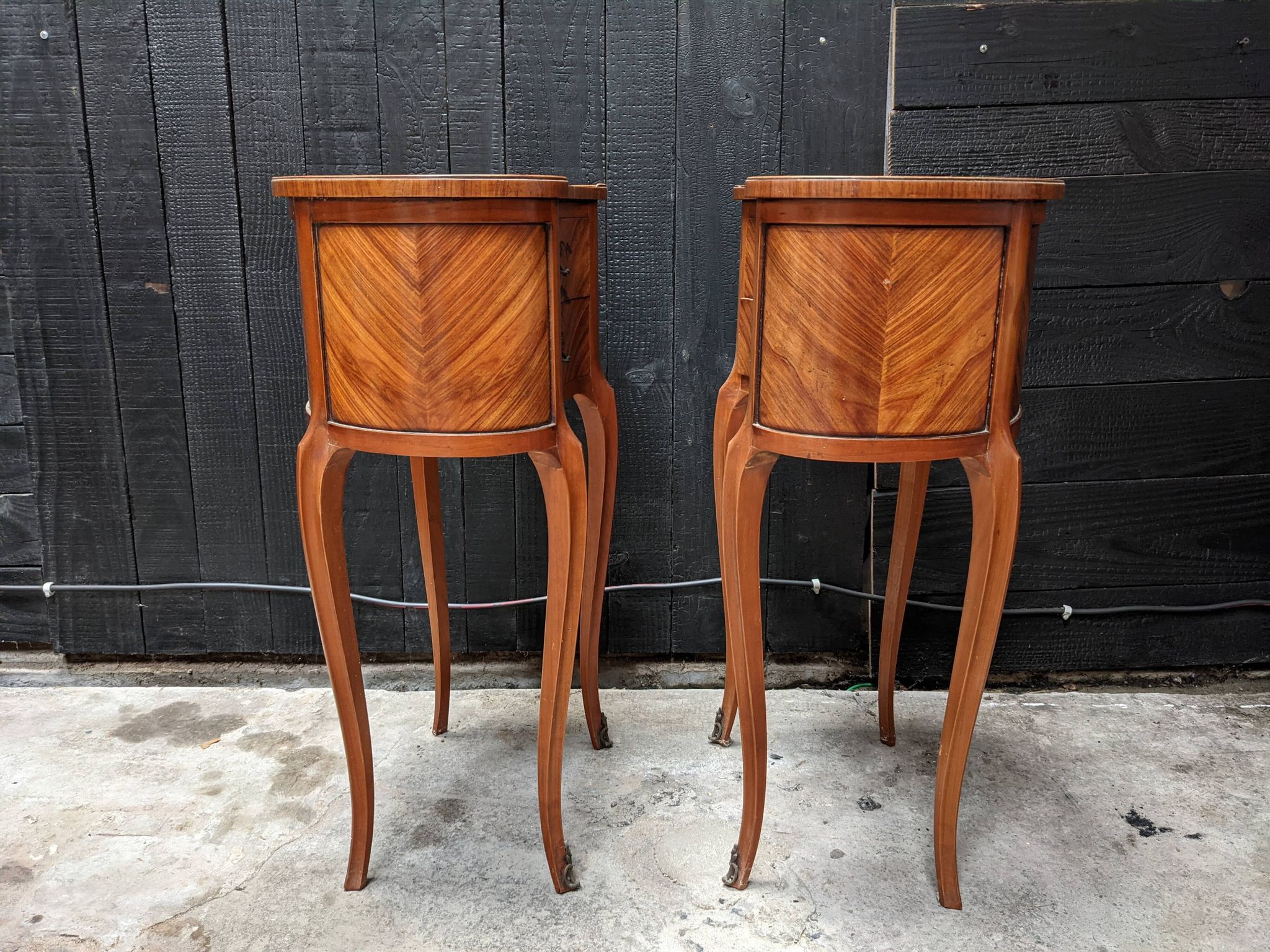 Pair of kidney bedside tables
