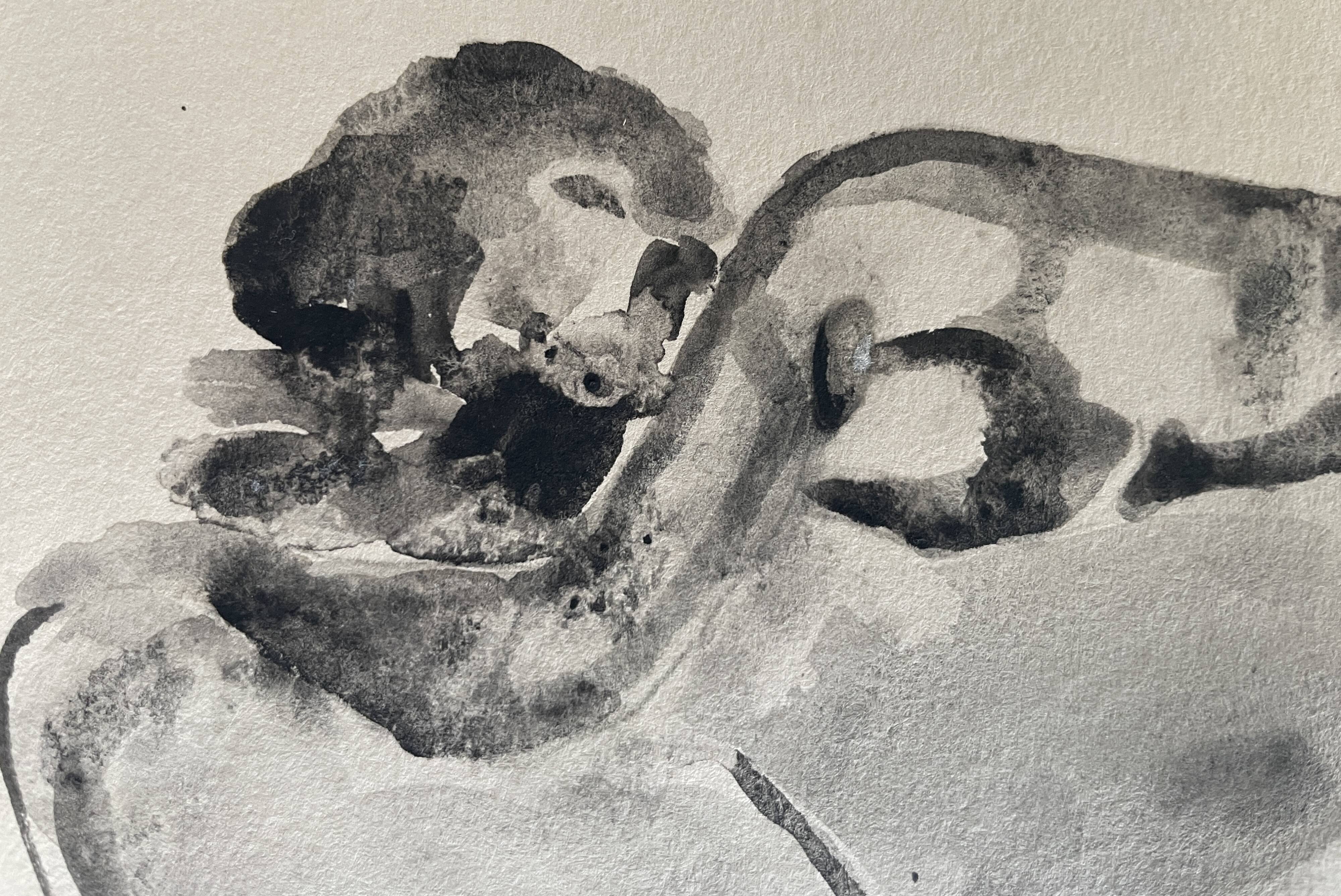 Black monochrome watercolor of a reclining woman signed