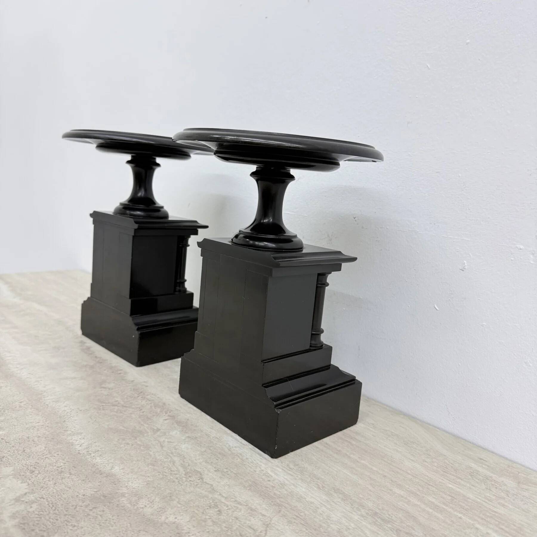Antique French black marble cassoulets gilt decor pedestals neoclassical pair, 1900s