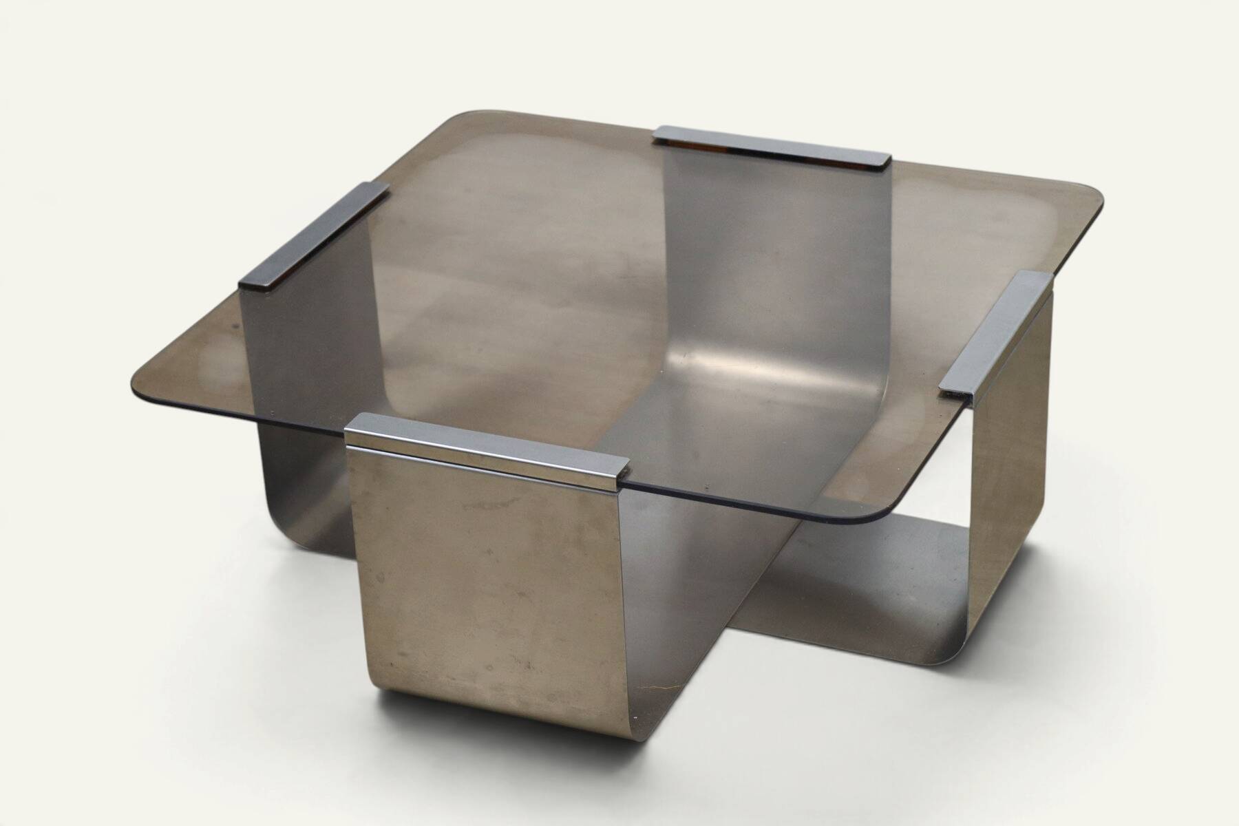 Brushed steel and smoked glass coffee table, by François Monnet – 1970s