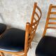 Set of 4 vintage wooden chairs with faux leather.