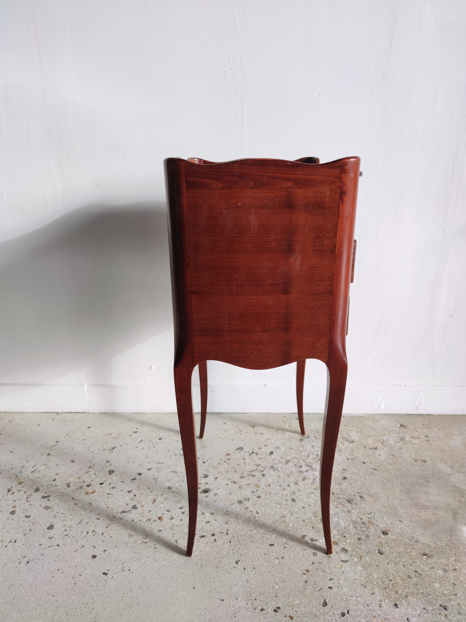 Three-drawer cherry bedside table