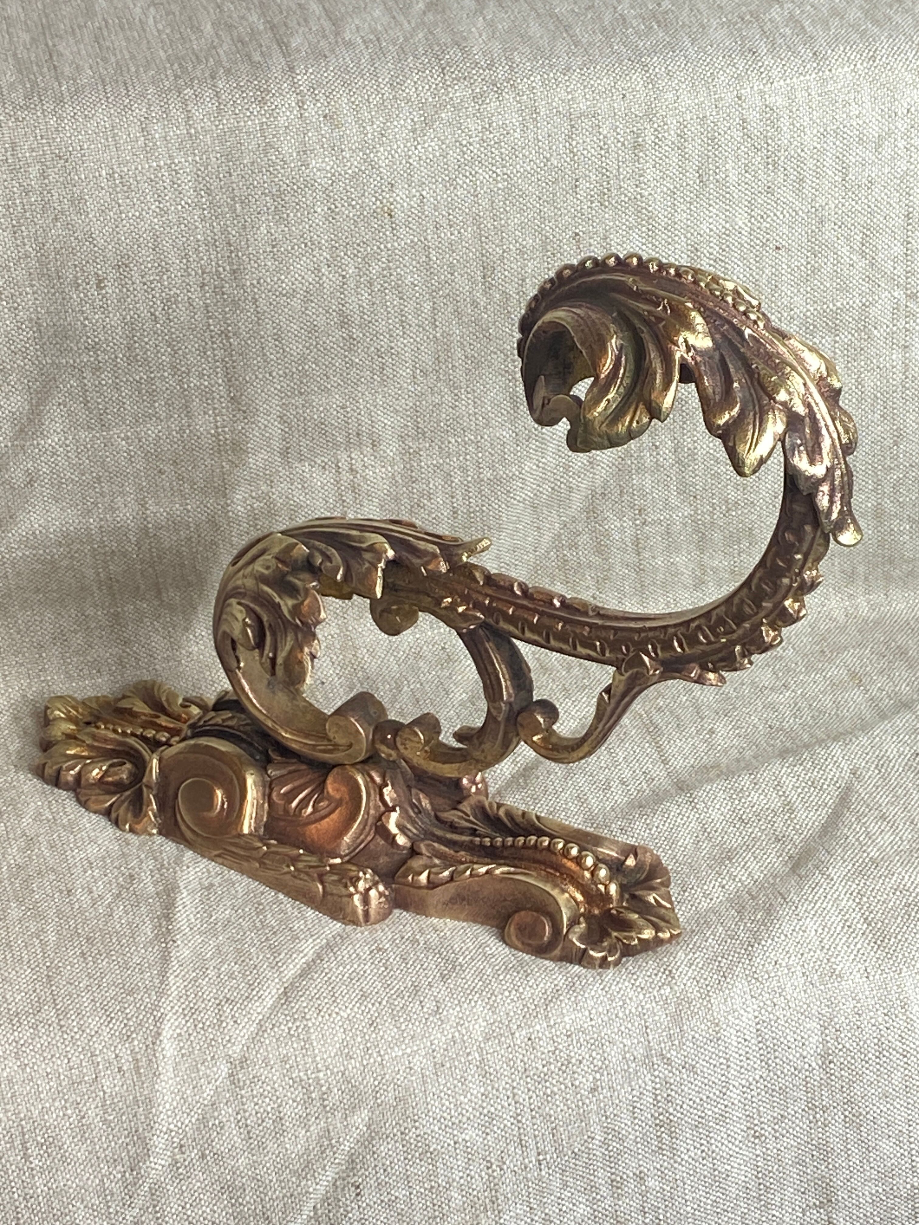 Golden bronze coat hook, 19th century