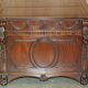 Partner desk with two carved columns featuring lion heads, according to Thomas Chippendale, restored.