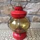 Vintage round glass and metal storm lamp