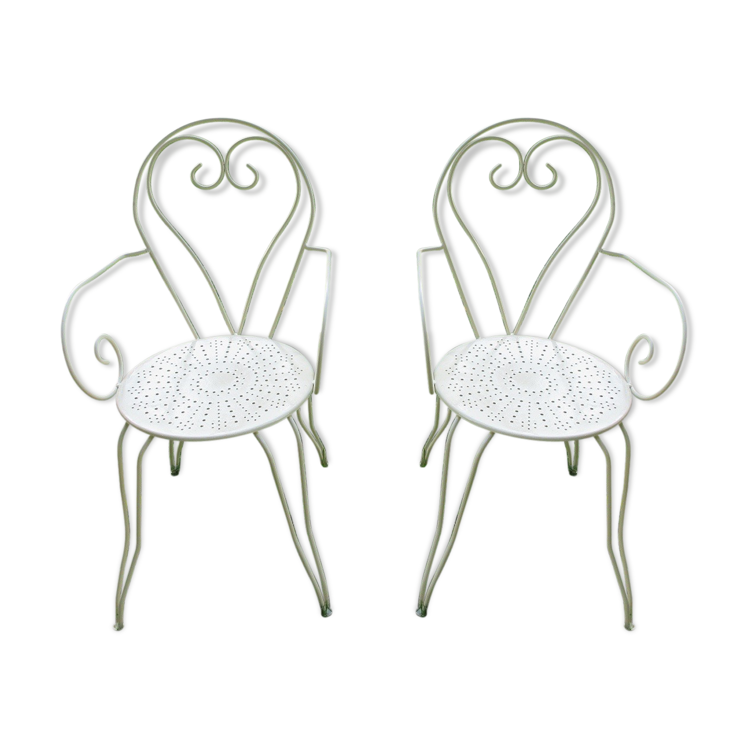 Pair of wrought iron armchairs