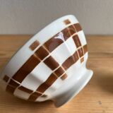 Antique faceted bowl on earthenware pedestal