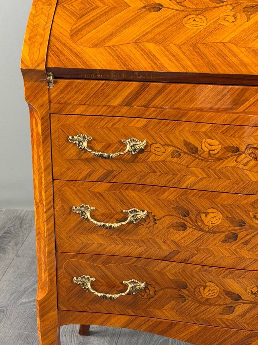 Louis XV style writing desk with a drop-leaf, made of veneer and marquetry, 19th century.