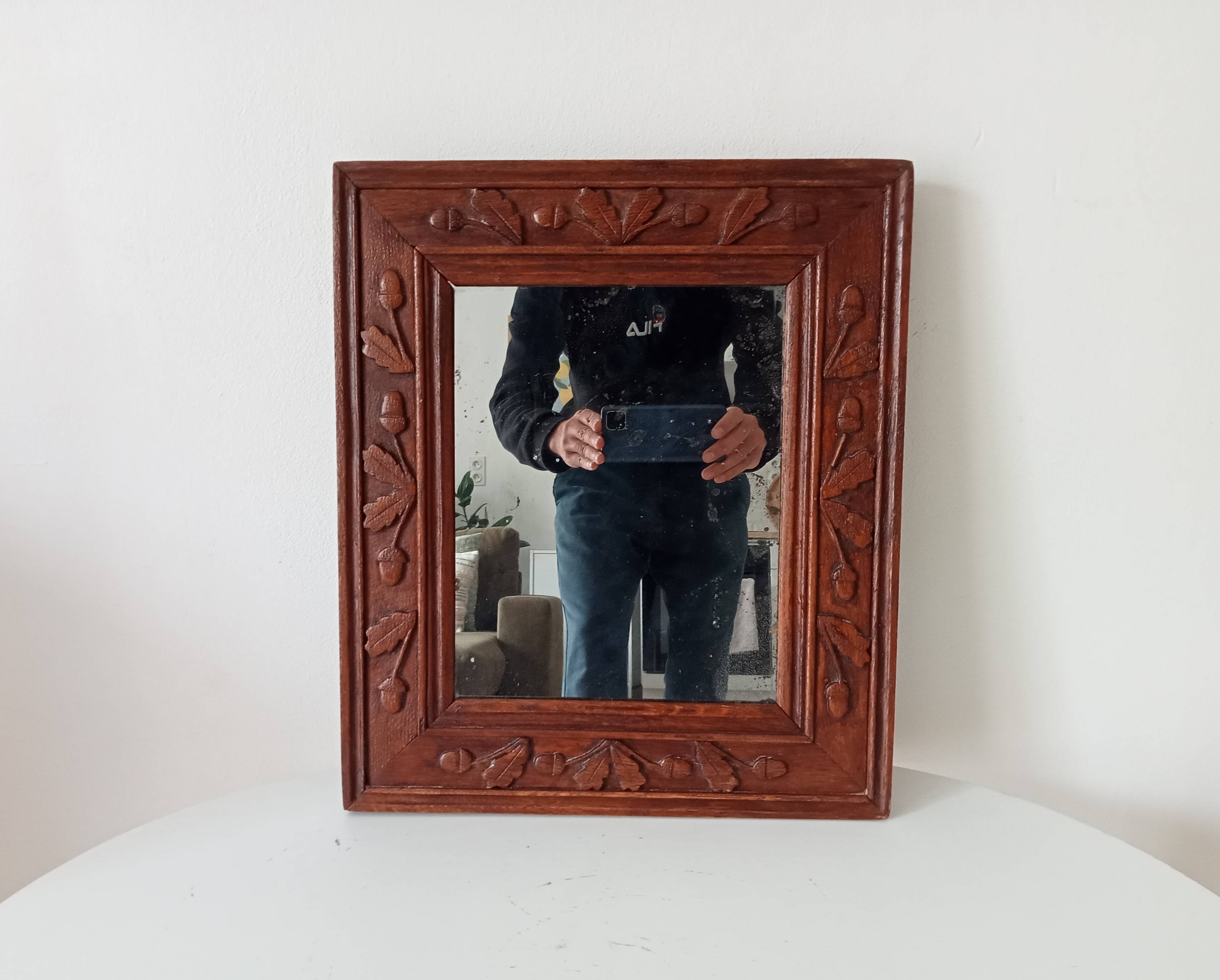 Antique mirror in carved wood