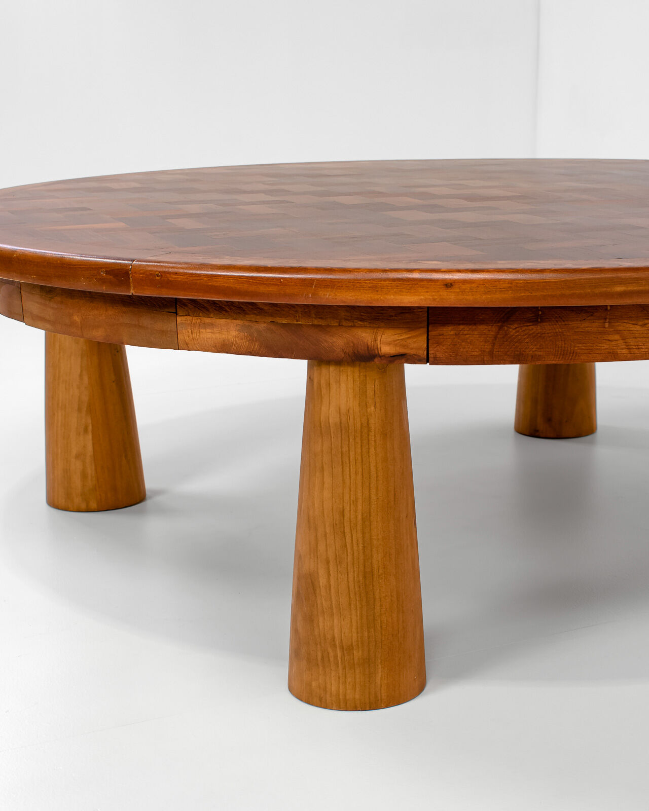 Round parquet coffee table with conical legs, spain
