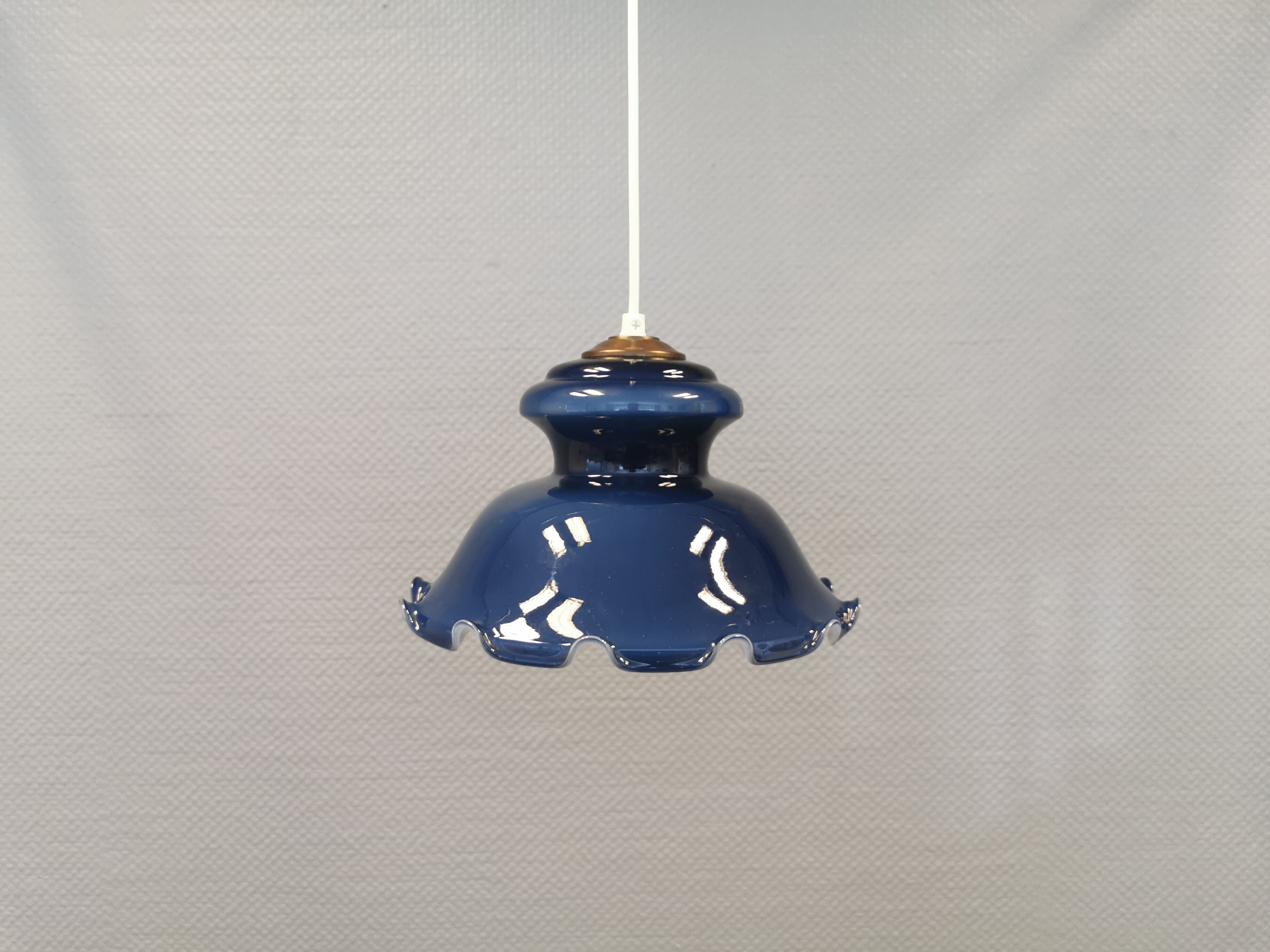 Hanging lamp in double layer opal glass, blue on the outside and white on the inside.